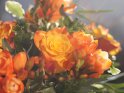 Blumenstrauß mit orangenen Rosen