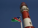 Leuchtturm von Swakopmund mit der Flagge Namibias