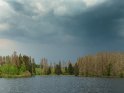Brenbrucher Teich mit Gewitterwolken im Hintergrund