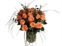 Vase mit einem Blumenstrauss aus Rosen